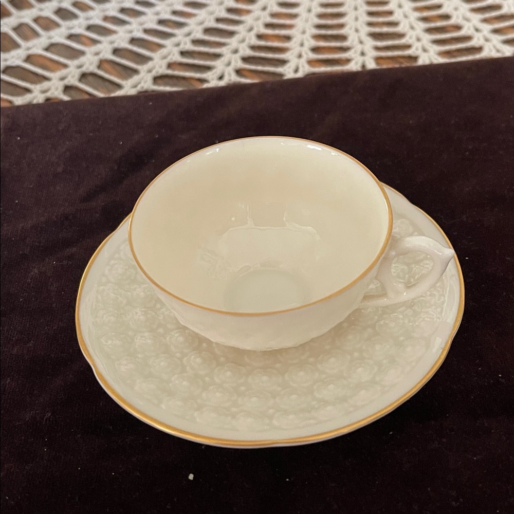 Elegant Cream Teacup and Saucer Set